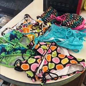 5 swim suits listed separately for $7.00. Sold as a bundle only $20.00